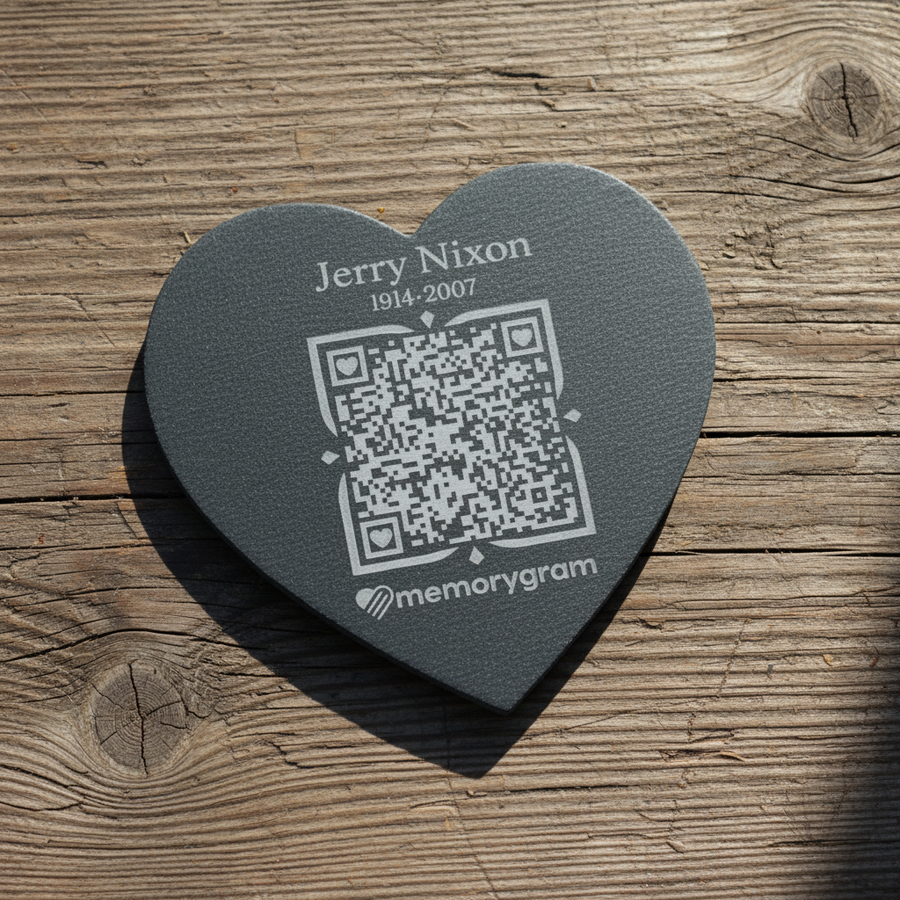 Black heart 4 by 4 inch Memorygram medallion engraved with a name and years