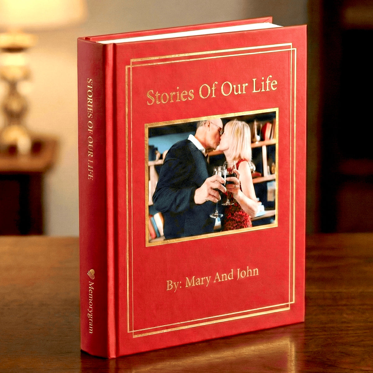 Red hardcover biography titled Stories of Our Life, written for a couple