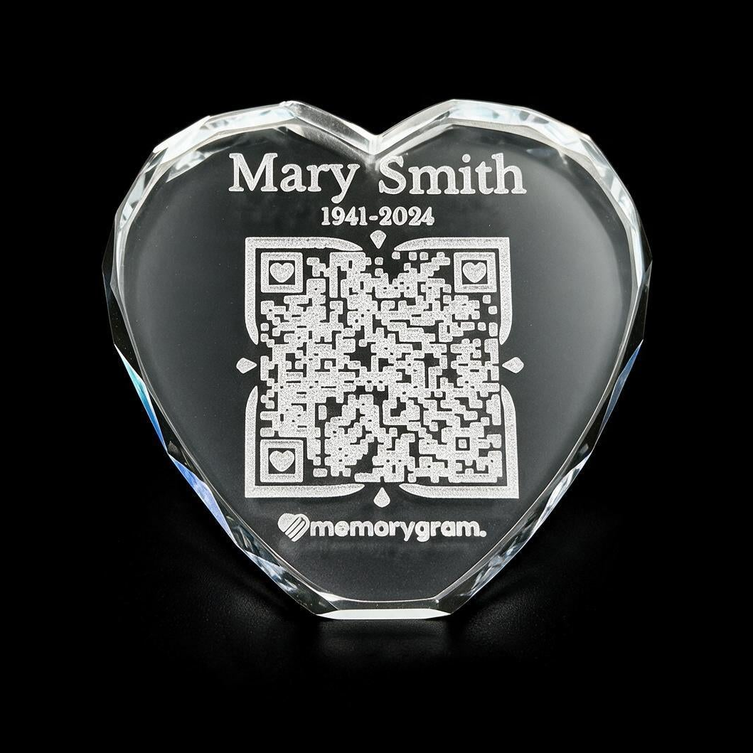 Heart-shaped QR Remembrance Crystal engraved with name, dates and QR code linking to a Virtual Memorial