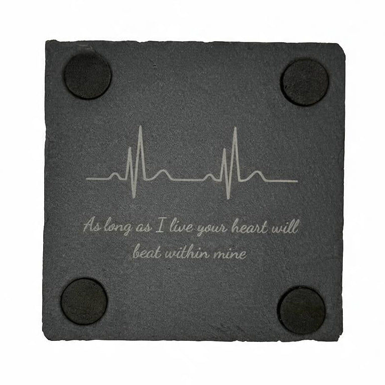 Back of slate coaster with engraved heartbeat and saying: As long as I live your heart will beat within mine