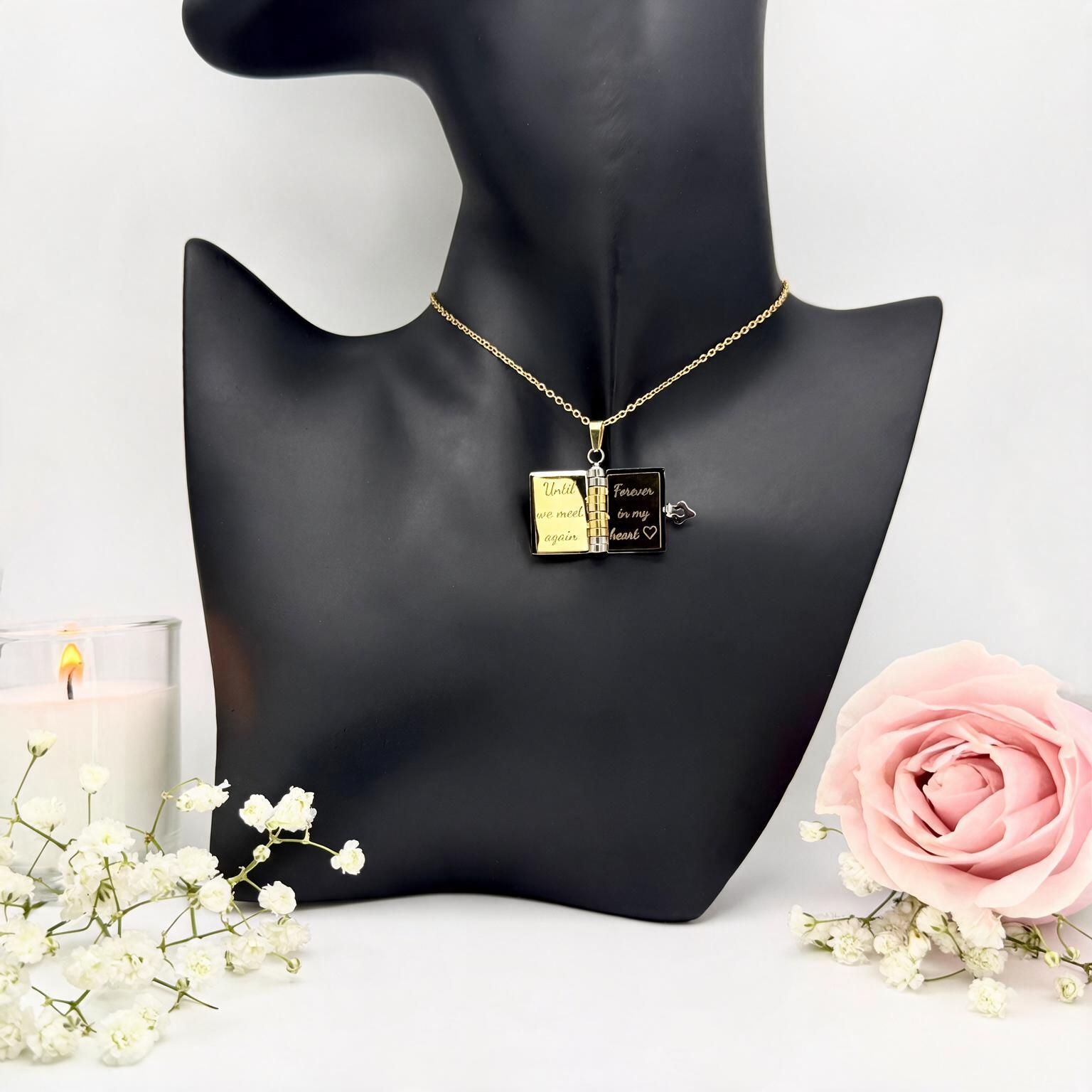 Open book necklace with short messages engraved inside the pages